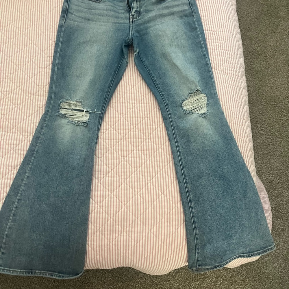 Buckle Light Blue Distressed Flare Jeans